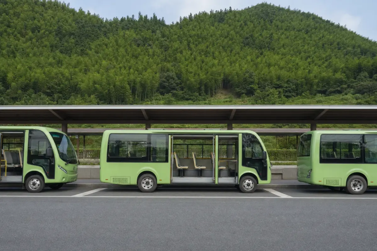 The Yucun transfer center at the foot of Moganshan, with scenic-area vehicles waiting at the boarding bays