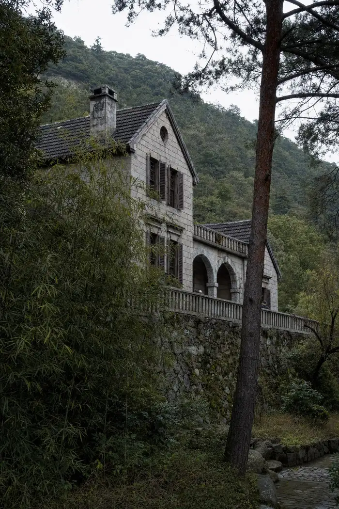Stone villas of the Moganshan hill station under bamboo