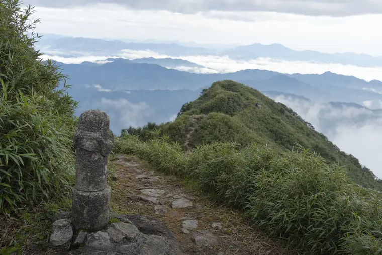 A bamboo trail climbing out of the valley
